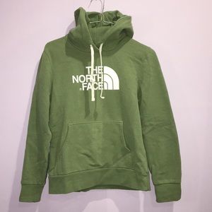 Woman’s Green North Face hoodie